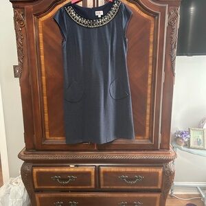 Elegant Navy Blue Midi Dress with Embellished Neckline